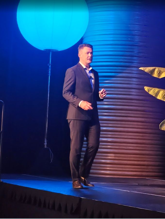 Forest Guider presenting on stage